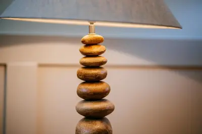 a close up of a pile of rocks on top of a lamp at The Stables at The Talbot in Lytham St Annes