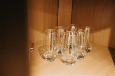 a group of empty glasses sitting on a table at Liverpool Warehouse Flat - Sleeps 5, WiFi, Free On-Site Parking in Liverpool
