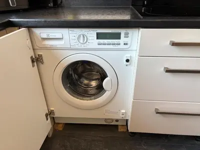 a white washer and dryer in a kitchen at SmithStayz Poulton in Poulton le Fylde