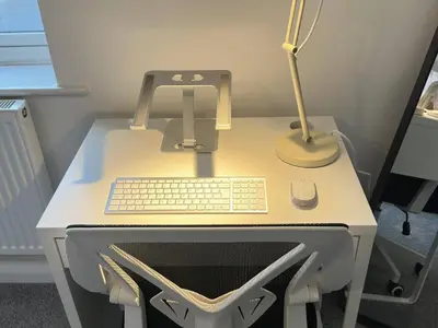 a desk with a keyboard and a computer on it at Coastal 2 Bathroom Apartment, Free Parking in Moreton