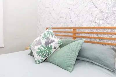 a bedroom with two pillows on a bed at Very Spacious 2 Bath Free Parking in Liverpool