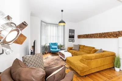 a living room with two couches and a couch at Very Spacious 2 Bath Free Parking in Liverpool