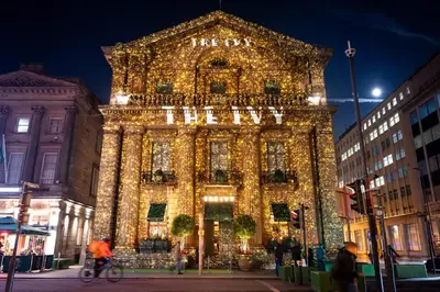 a large building with christmas lights on it at Castle St Steps to Ivy Washer Pet-Friendly in Liverpool