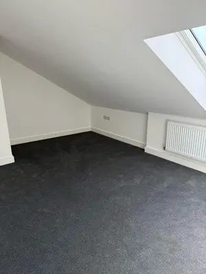 an empty room with white walls and a ceiling at Comfortable and Modern Living house in St Helens in Saint Helens