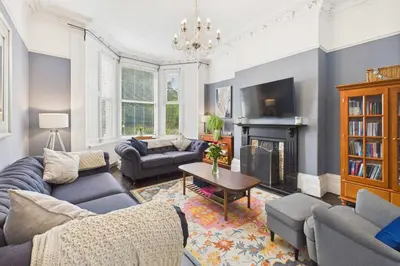 a living room filled with furniture and a fireplace at Host & Stay - Beech Street in Liverpool