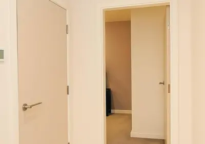 an open door to a closet in a room at Urban Nest Liverpool Near Cavern Quarter sleeps in Liverpool