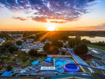 an aerial view of a resort with the sunset at Dennys Holiday Home Pet Free in Blackpool