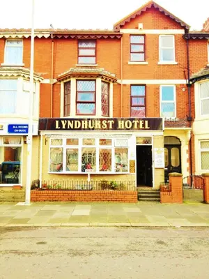 akritkritkrit hotel on a street in front of a building at Lyndhurst Hotel in Blackpool