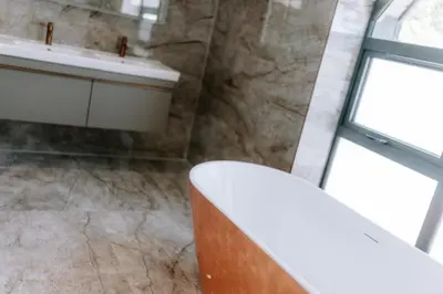 a bathroom with a sink and a mirror at Fell View & Beaufort House in Preston