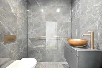 a bathroom with a bowl sink and a toilet at Fell View & Beaufort House in Preston