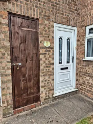 a brick building with a door and a white door at Self-contained 1 bedroom flat in Liverpool