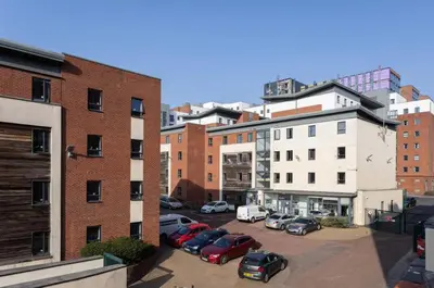 a group of cars parked in a parking lot at Student Only Ensuite at Prospect Point Liverpool in Liverpool
