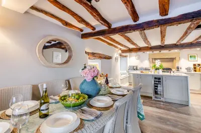 a kitchen and dining room with a table and chairs at 4 Bed in Cartmel oc-d31802 in Cartmel