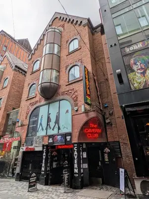 a brick building with a sign on the side of it at Gorgeous GF 2 Bed 2 bathroom Apartment Liverpool 3 in Liverpool