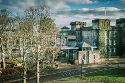 a large building with ivy on the side of it at Waddell Hall, University of Cumbria in Lancaster