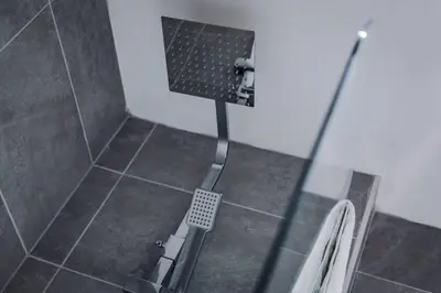 a shower with a glass door and a toilet in a bathroom at Central 2 Beds with Free Parking in Liverpool