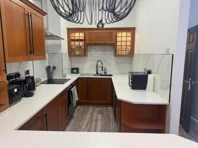 a kitchen with a sink and a counter top at Luxury Double Liverpool City Centre Penthouses 8 Guests in Liverpool