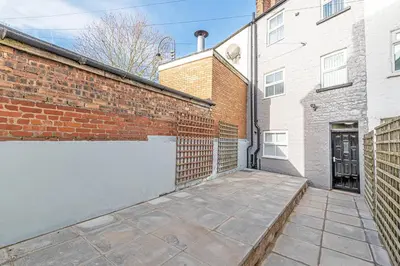 an empty driveway in front of a brick building at Kemble House - Air Host & Stay - 5 Bedroom, 5 Bathroom - Sleeping 10 in Prescot