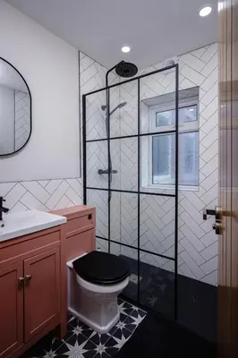 a bathroom with a toilet and a glass shower at Blackpool Beauty! - Full House - Sleeps 9 in Blackpool