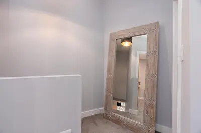 a mirror on a wall in a room at Parson Castle View, Sleeps 6, Clitheroe Centre in Clitheroe