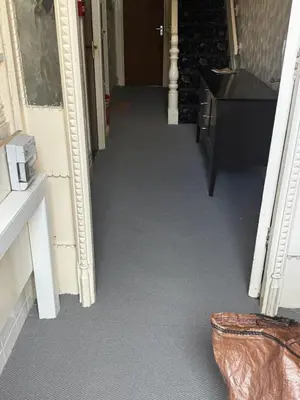 a hallway leading to a room with a hallway at Ground Floor Cute & Cozy - 1 Person Studio - South Pier in Blackpool