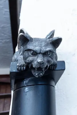 a statue of a cat on top of a pole at St Andrews by Guestz in Lytham St Annes