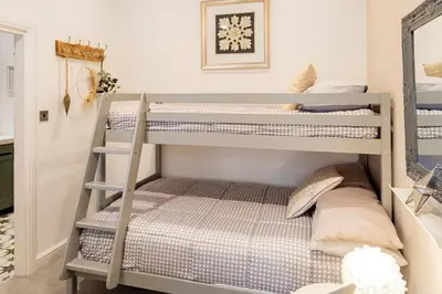 a bunk bed room with two bunk beds at The Lodge at Greenbank Farm