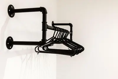 a black object hanging from a wall at Comfortable Apartment In The Centre Of Preston in Preston