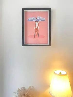 a picture hanging on a wall above a lamp at #55 Spacious2BR End-Terrace in Kensington Sleeps 6 in Liverpool
