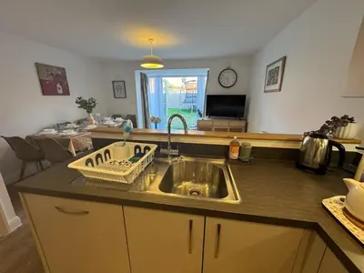 a kitchen with a sink and a counter top at #55 Spacious2BR End-Terrace in Kensington Sleeps 6 in Liverpool