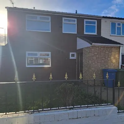 a house with a fence in front of it at Liverpool Rooms Near City & Stadiums in Liverpool
