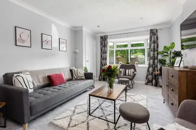 a living room with a couch and a table at Curlew Stays - Semi Detached Home - Pet Friendly in Thornton