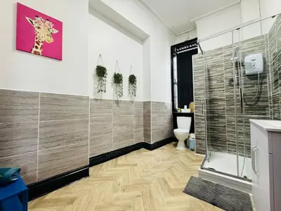 a bathroom with a shower and a toilet at Pembroke Place Private Room 9 in Liverpool