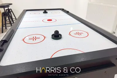 a pool table with red circles on it at Crews Cabin in Fleetwood
