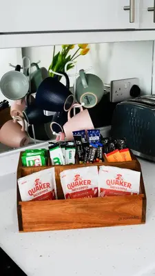 a table with a tray of food on a counter at Santiago 4 in Southport