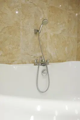a shower in a bathroom with a white tub at Luxury stay in Central Southport in Southport