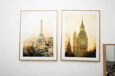 three framed pictures of big ben and big clocks at Cosy Studio Near Goodison & Anfield, Liverpool in Liverpool