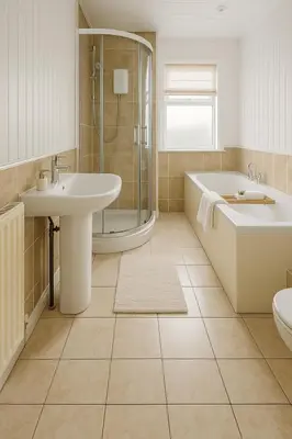 a bathroom with a sink and a tub and a shower at Cosy Two-Bedroom House in Ormskirk in Pemberton