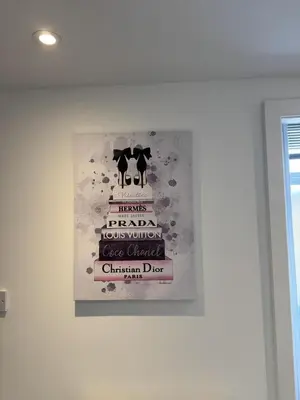 a picture of a sign on a wall at Blackpool Abode - Suites by the Sea in Blackpool