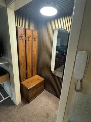 a small bathroom with a sink and a mirror at Reads Avenue 1 Bed Apartment - Next To H&A Social Club - Minutes from Winter Gardens & Town Centre! in Blackpool