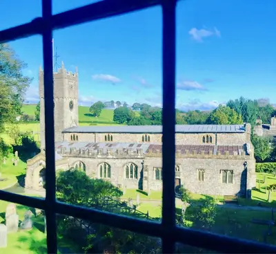 a view of a castle from a window at The Wheatsheaf at Beetham in Sandside