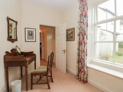 a home office with a desk and a window at The Old Kitchen in Grange Over Sands