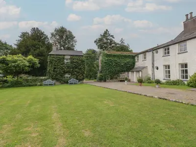 a large yard in front of a house at The Laundrymaid's Cottage in Grange Over Sands