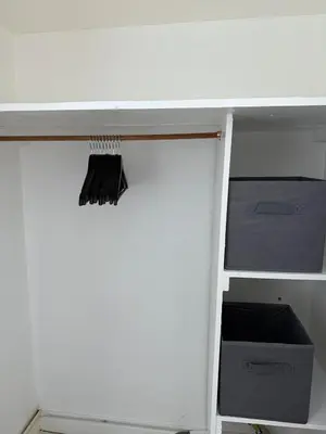 a white refrigerator with its door open with a broom at Anfield Stay Free Parking 5 minute walk in Liverpool