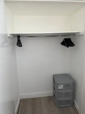 a shelf in a room with a desk at Anfield Stay Free Parking 5 minute walk in Liverpool