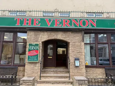 a sign that reads the verron on a building at VERNON Hotel in Blackpool