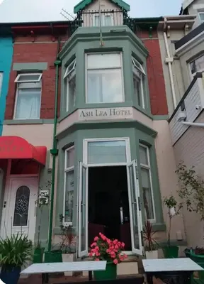 a building with the entrance to an inn lax hotel at Ash Lea Hotel in Blackpool