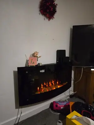 a living room with a fire place in a fireplace at Belek villa Demiralp in Liverpool