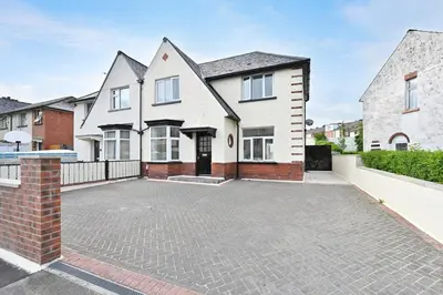 an empty driveway in front of a house at Sleek and Stylish 3 Bed in Bolton-Garden-Parking in Bradshaw
