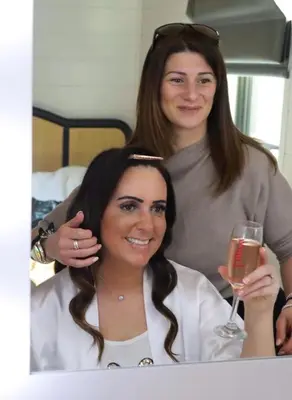 two women are holding a glass of wine at Staining Luxury Lodges in Poulton le Fylde